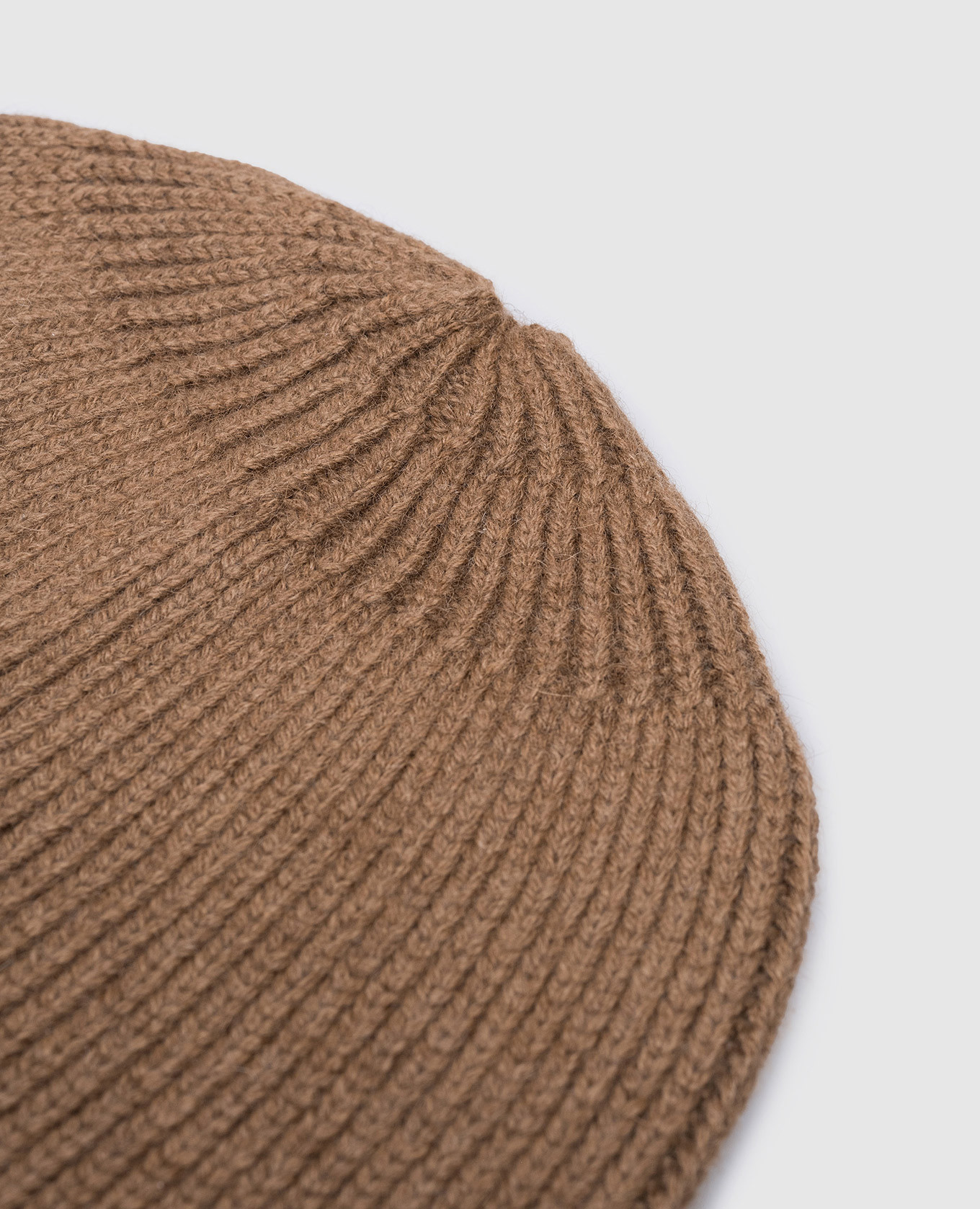

A brown cap made of camel wool Jan Jan Van Essche