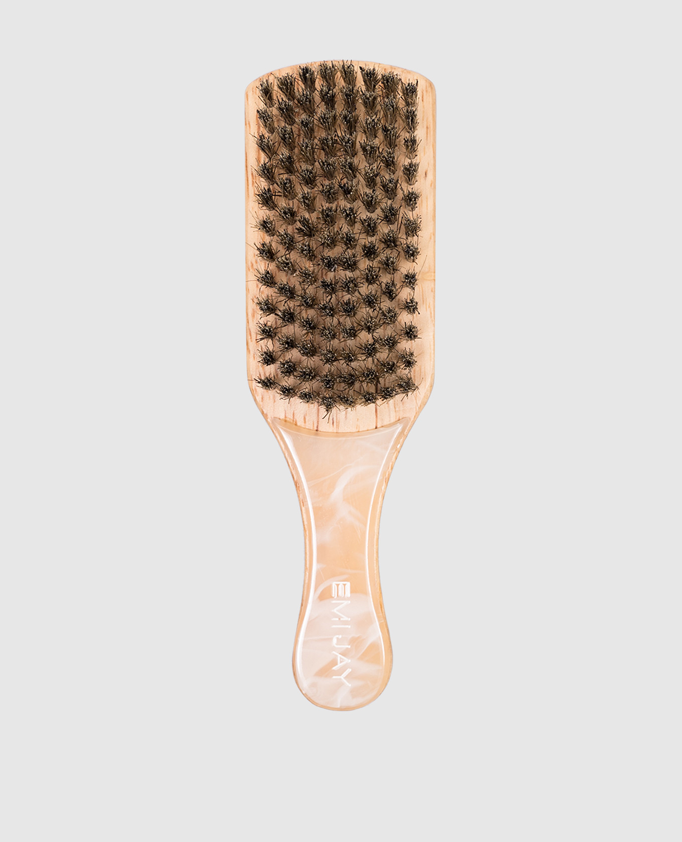 

Beige hairbrush with logo Emi Jay