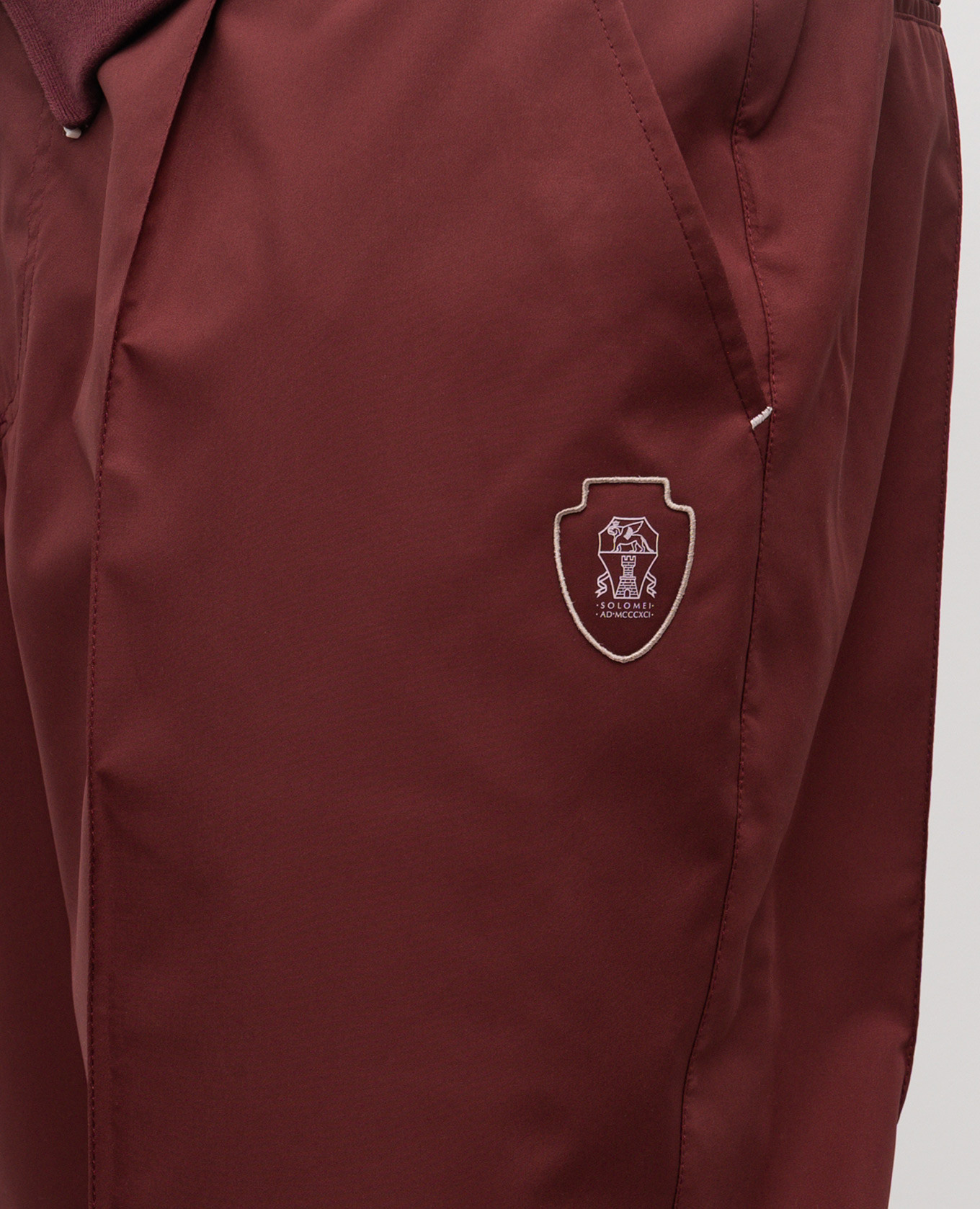 

Burgundy sweatpants with embroidered emblem Brunello Cucinelli
