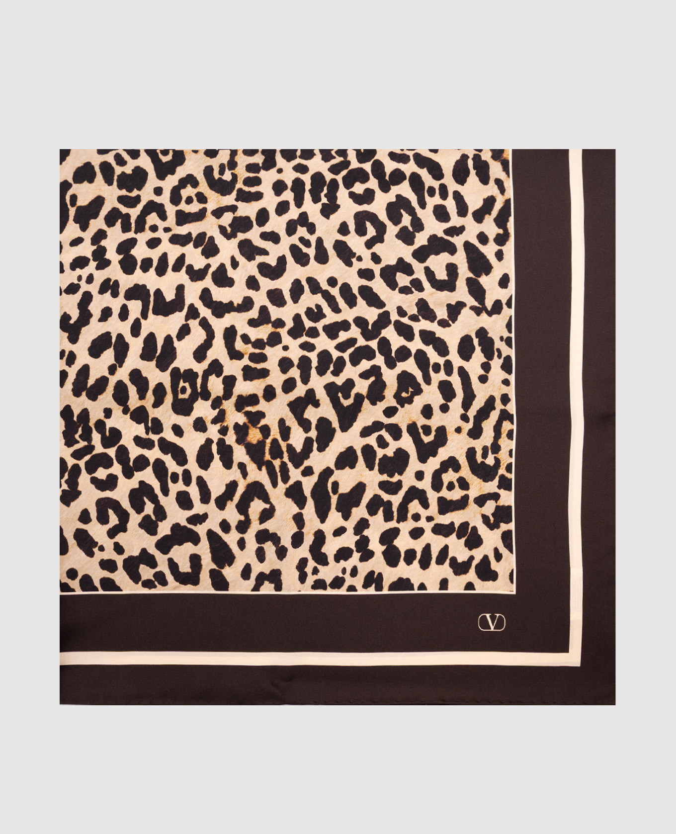 

Beige silk scarf with animal print Valentino