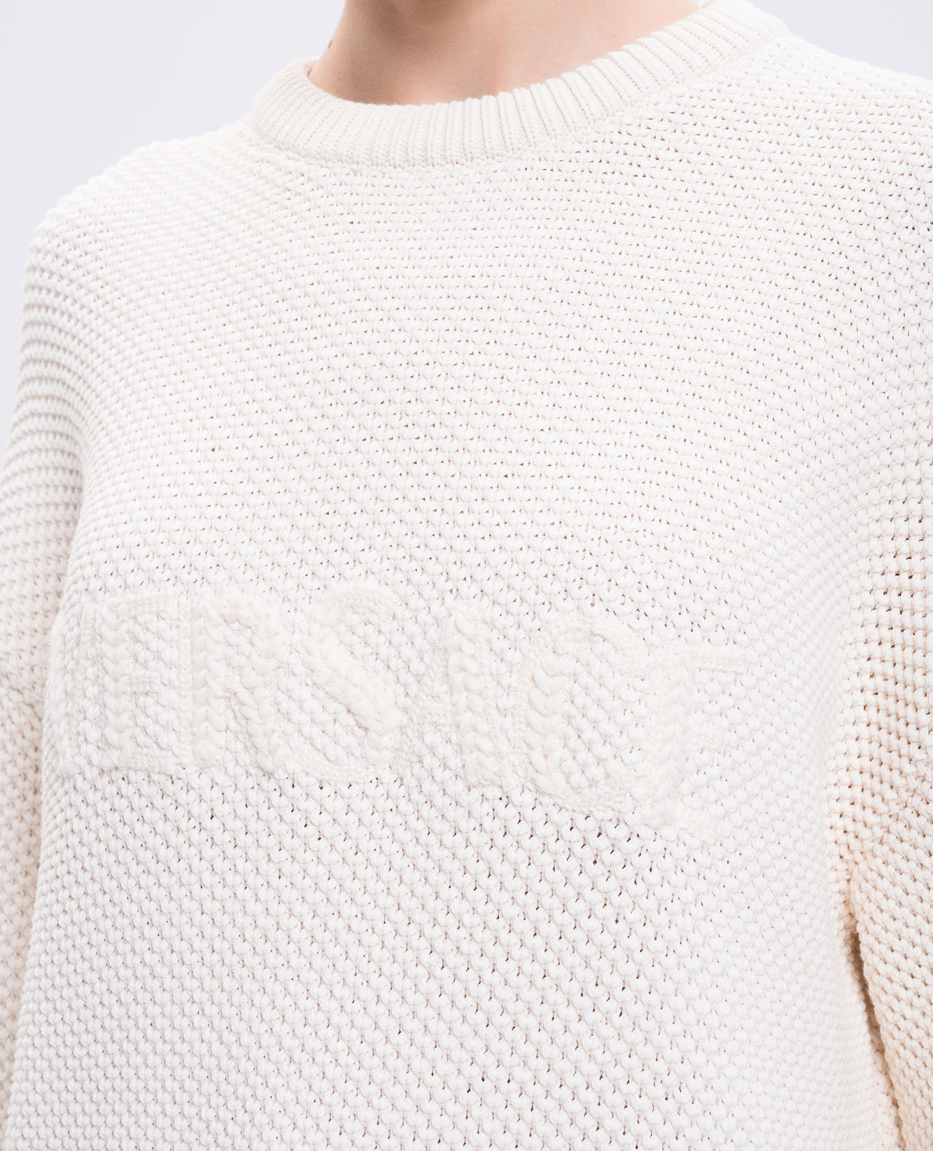 

Beige sweater with logo pattern Versace