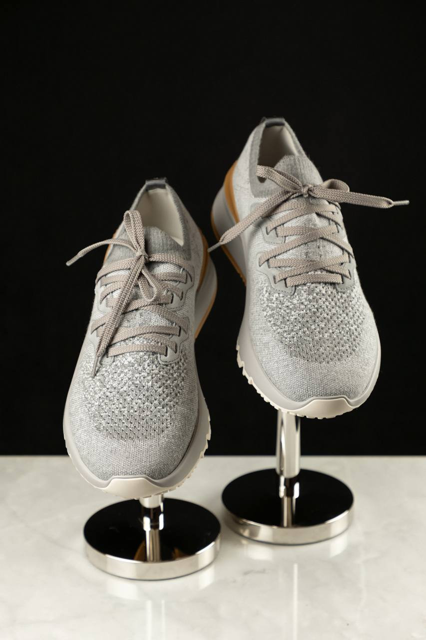 

Grey sneakers with logo in a degraded effect Brunello Cucinelli