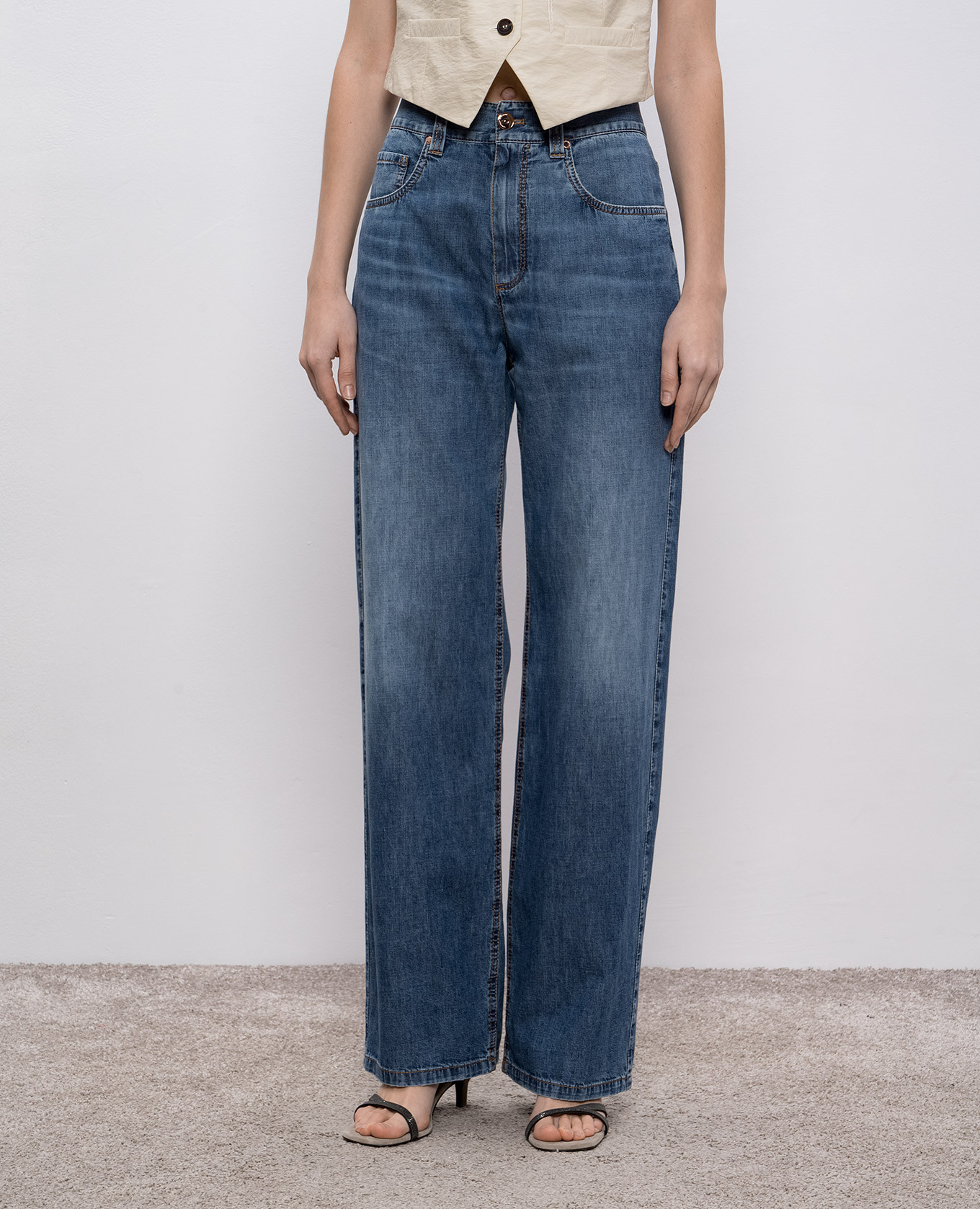 

Contemporary blue jeans with leather logo patch Brunello Cucinelli