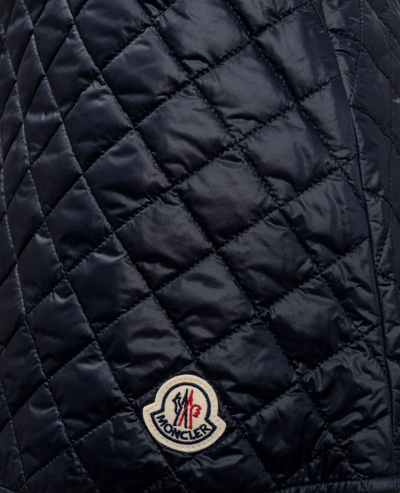 

Blue quilted mini skirt with logo patch Moncler
