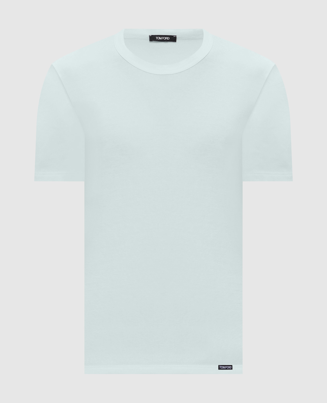 Green t-shirt with logo patch