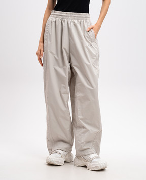 Vetements Beige sports pants with stripes UA66PA320W