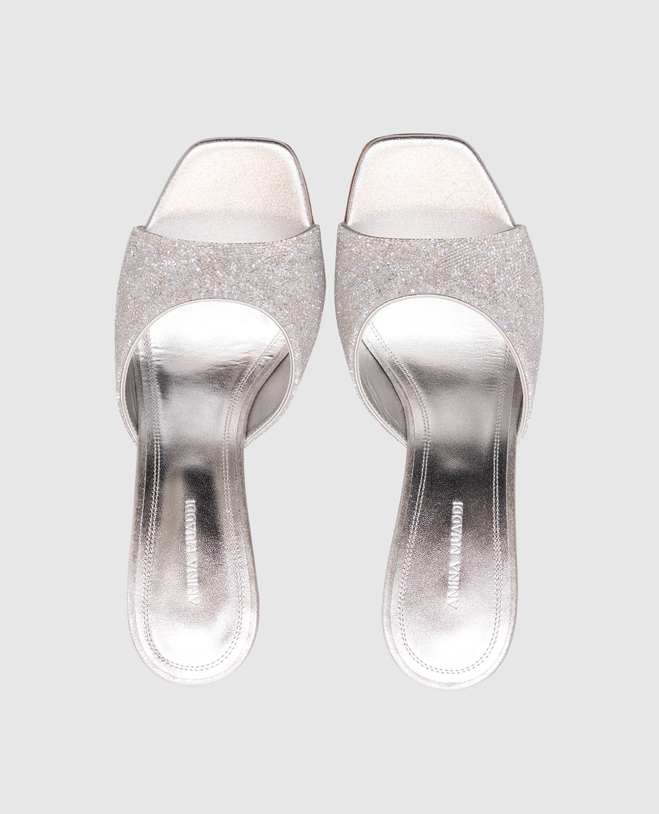 

Lupita silver mules with crystals Amina Muaddi