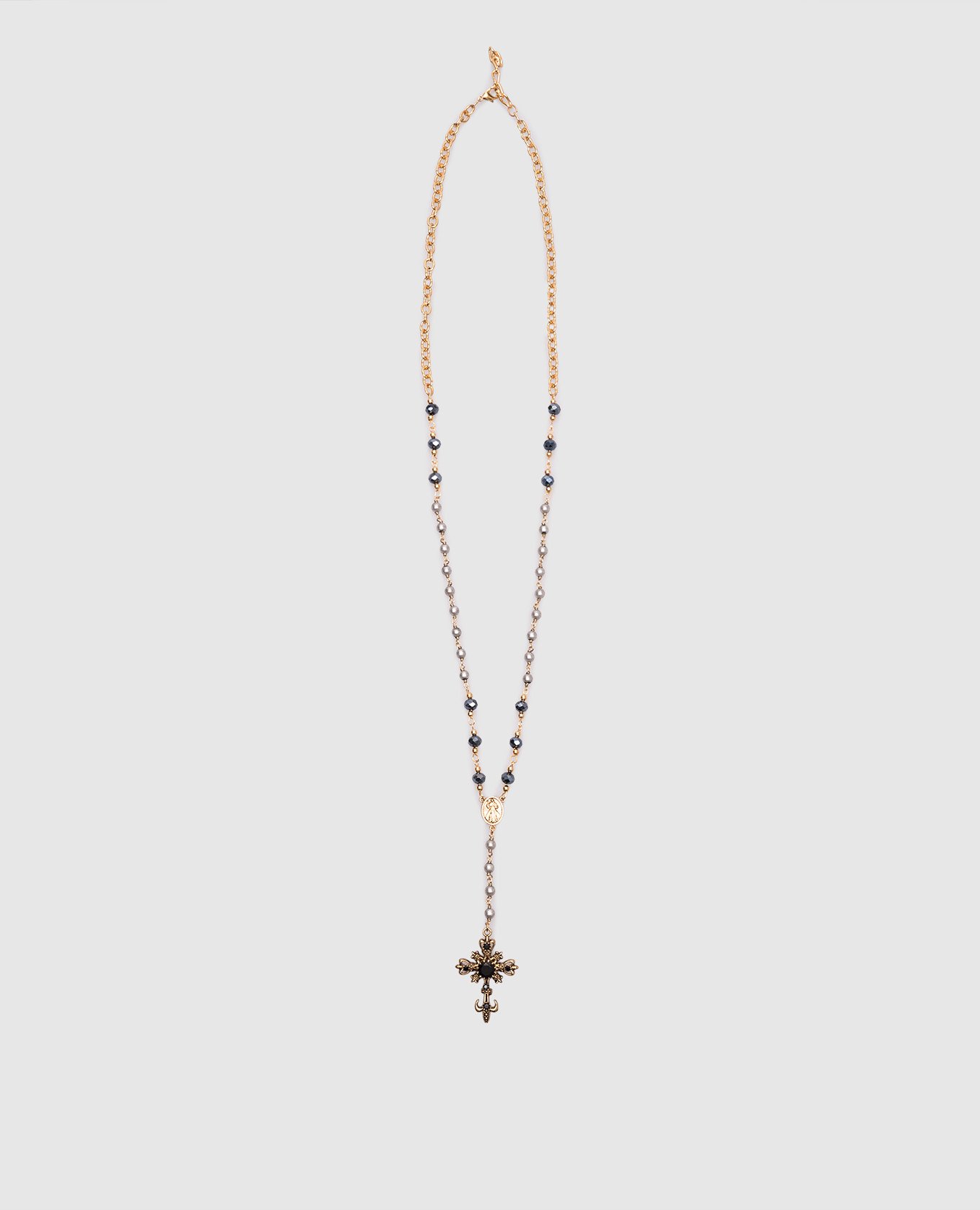 

Golden necklace with a cross CelesteG