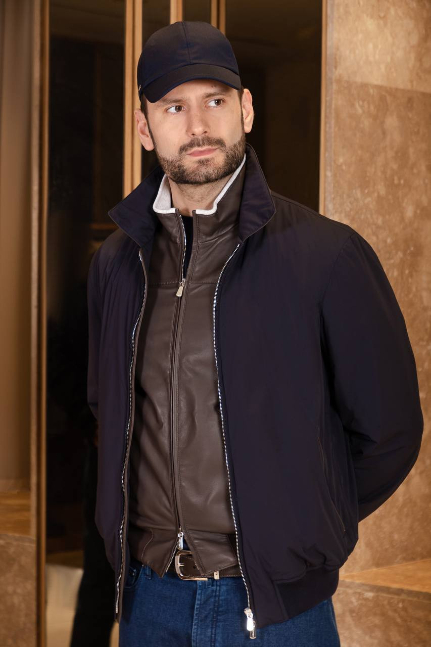 

Brown leather vest with logo Enrico Mandelli