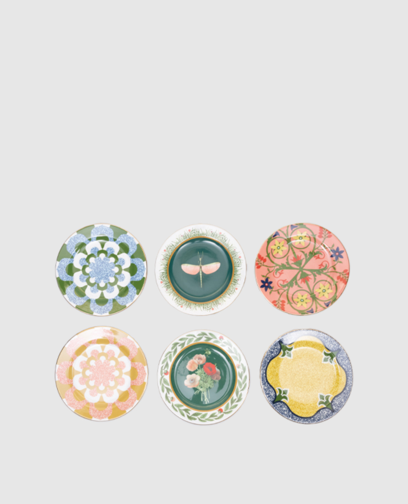 

A set of porcelain dessert plates with 18 carat gold plating La DoubleJ, White