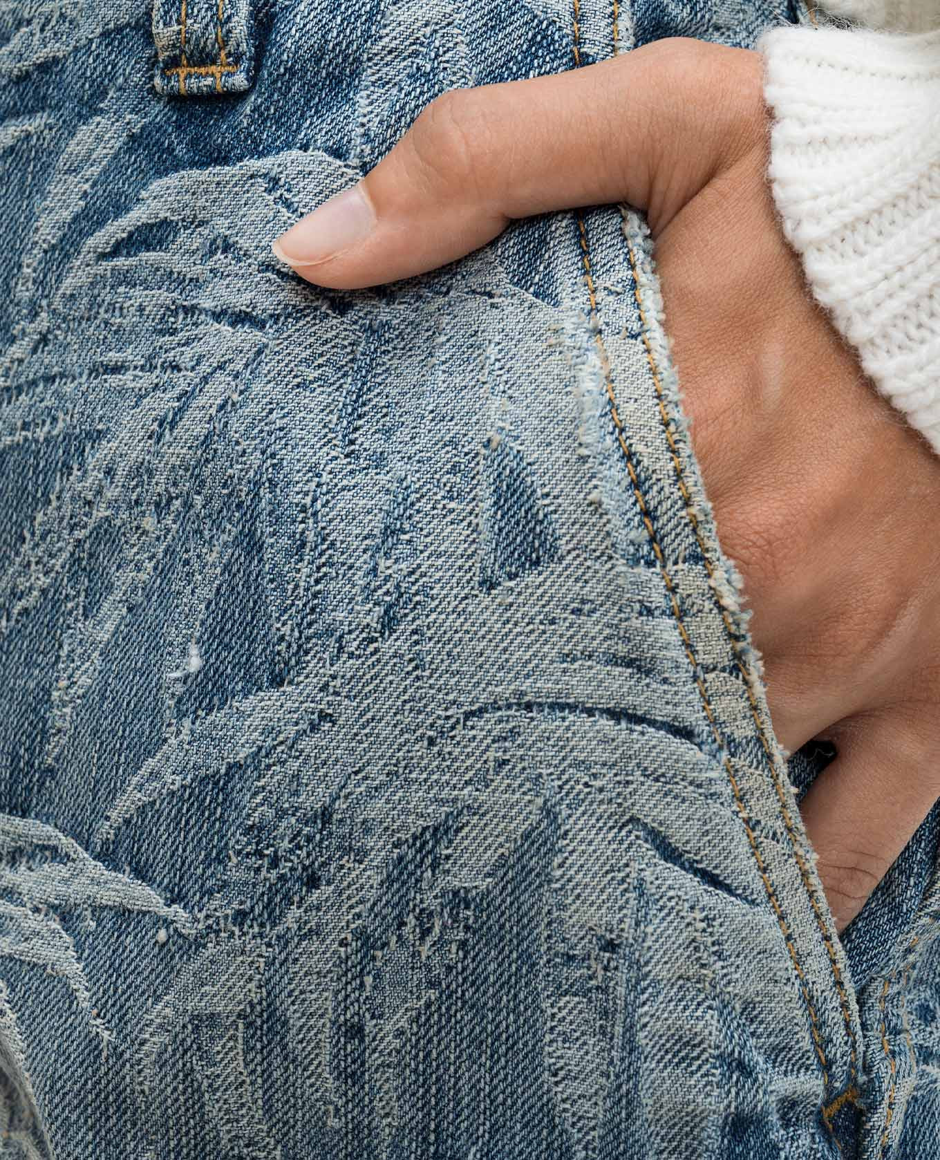 Blue jeans in a branded woven pattern with a vintage effect Palm Angels 5