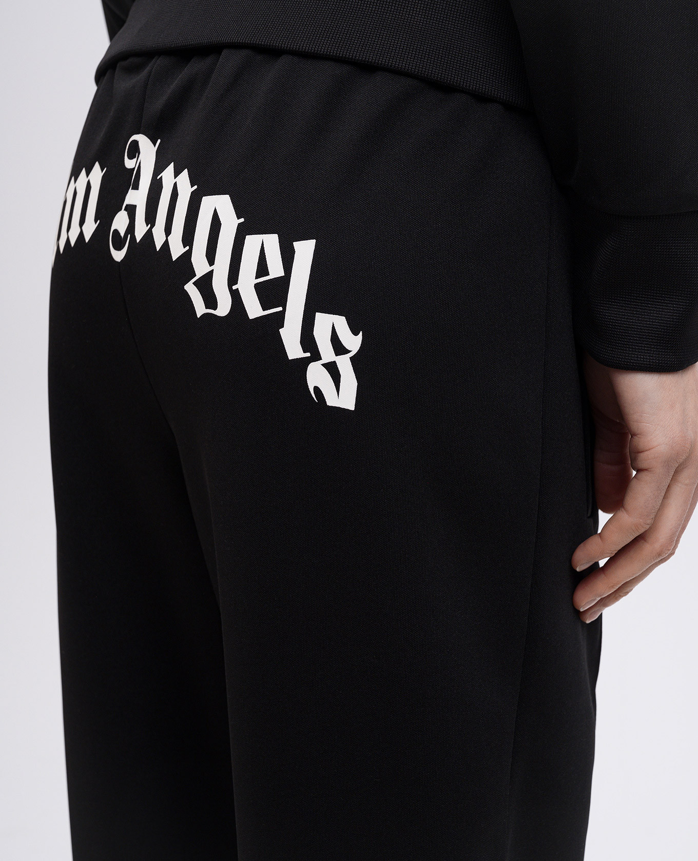 

Black pants with logo print Palm Angels