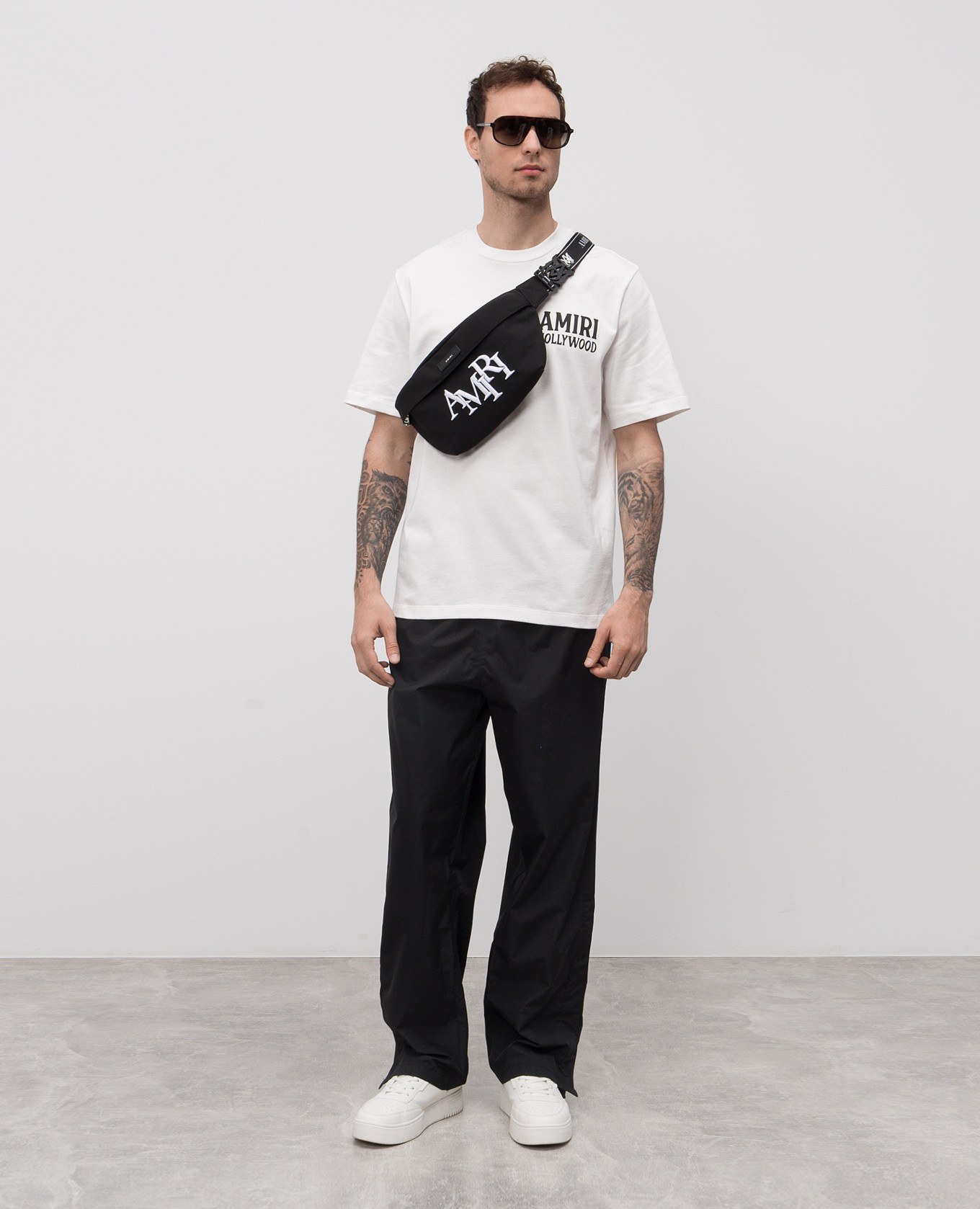 

JAZZ WOLF white T-shirt with logo print AMIRI