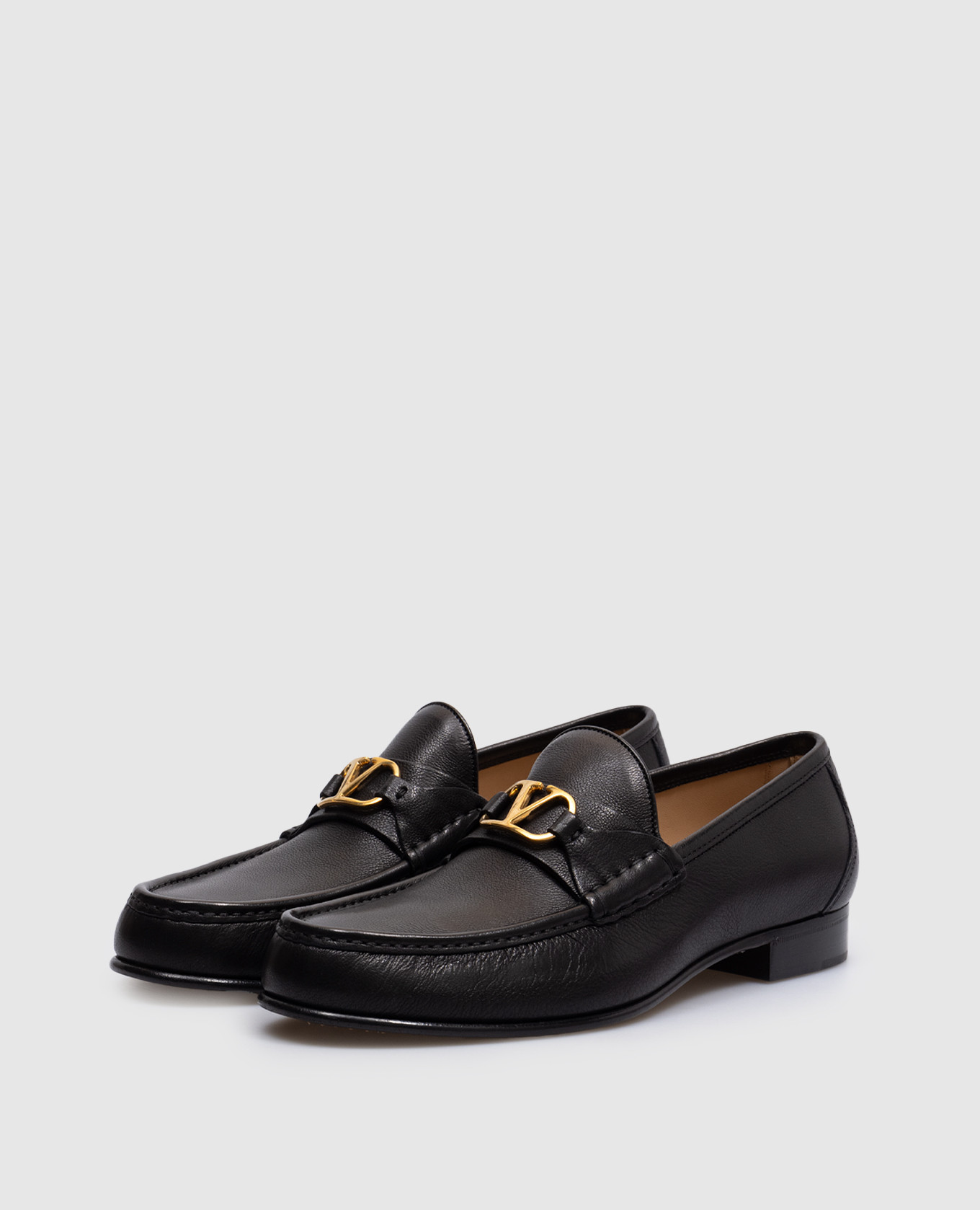 

BUFFALO black leather loafers with logo Valentino