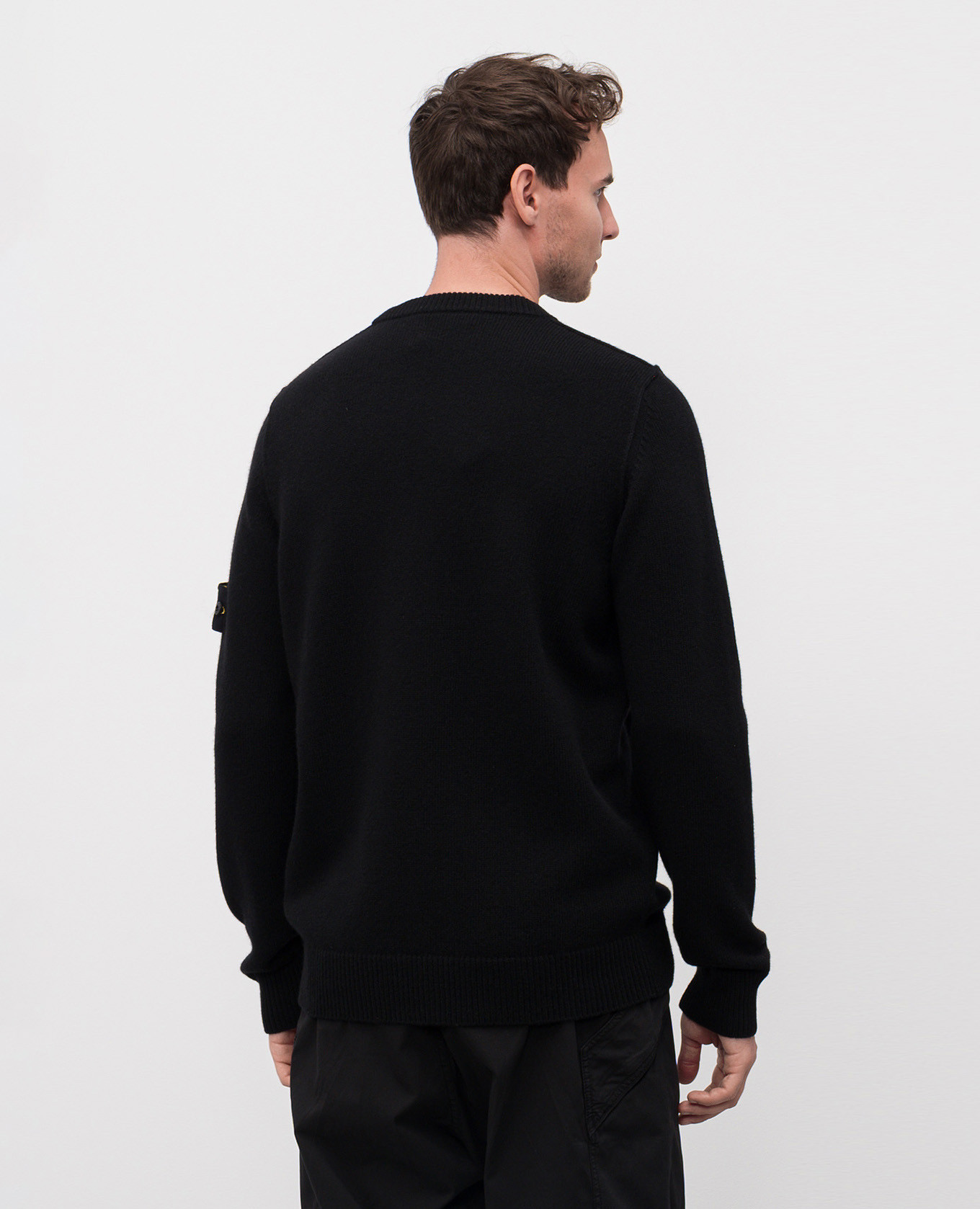 

Black wool sweater with logo Stone Island