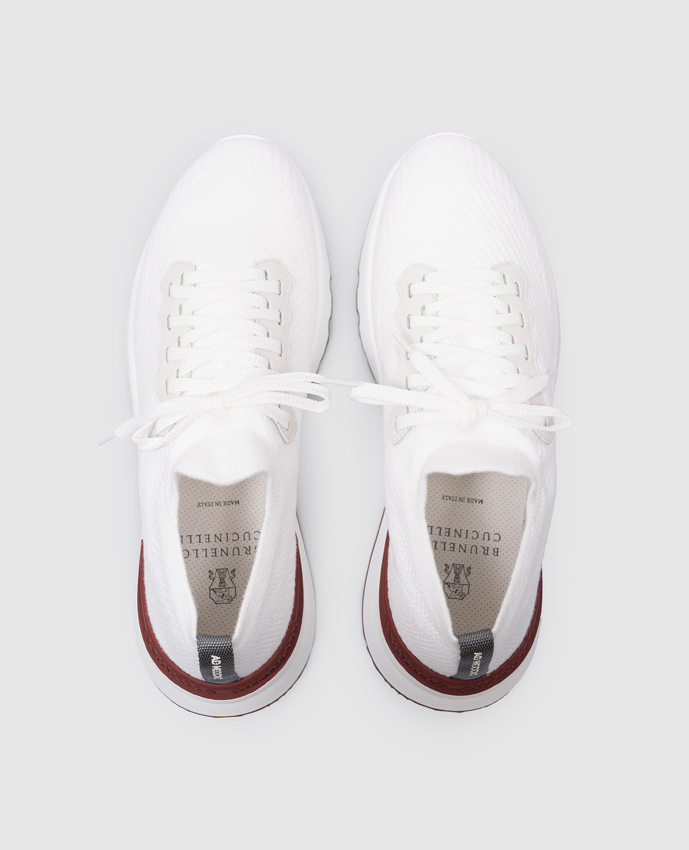 

White sneakers with leather inserts with a textured logo Brunello Cucinelli
