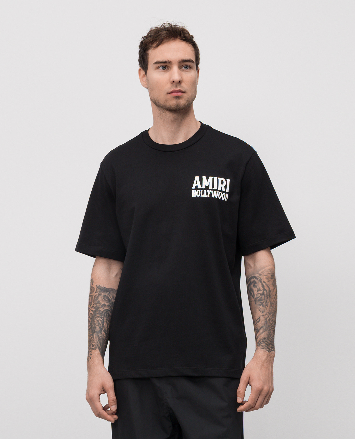 

JAZZ WOLF black T-shirt with logo print AMIRI