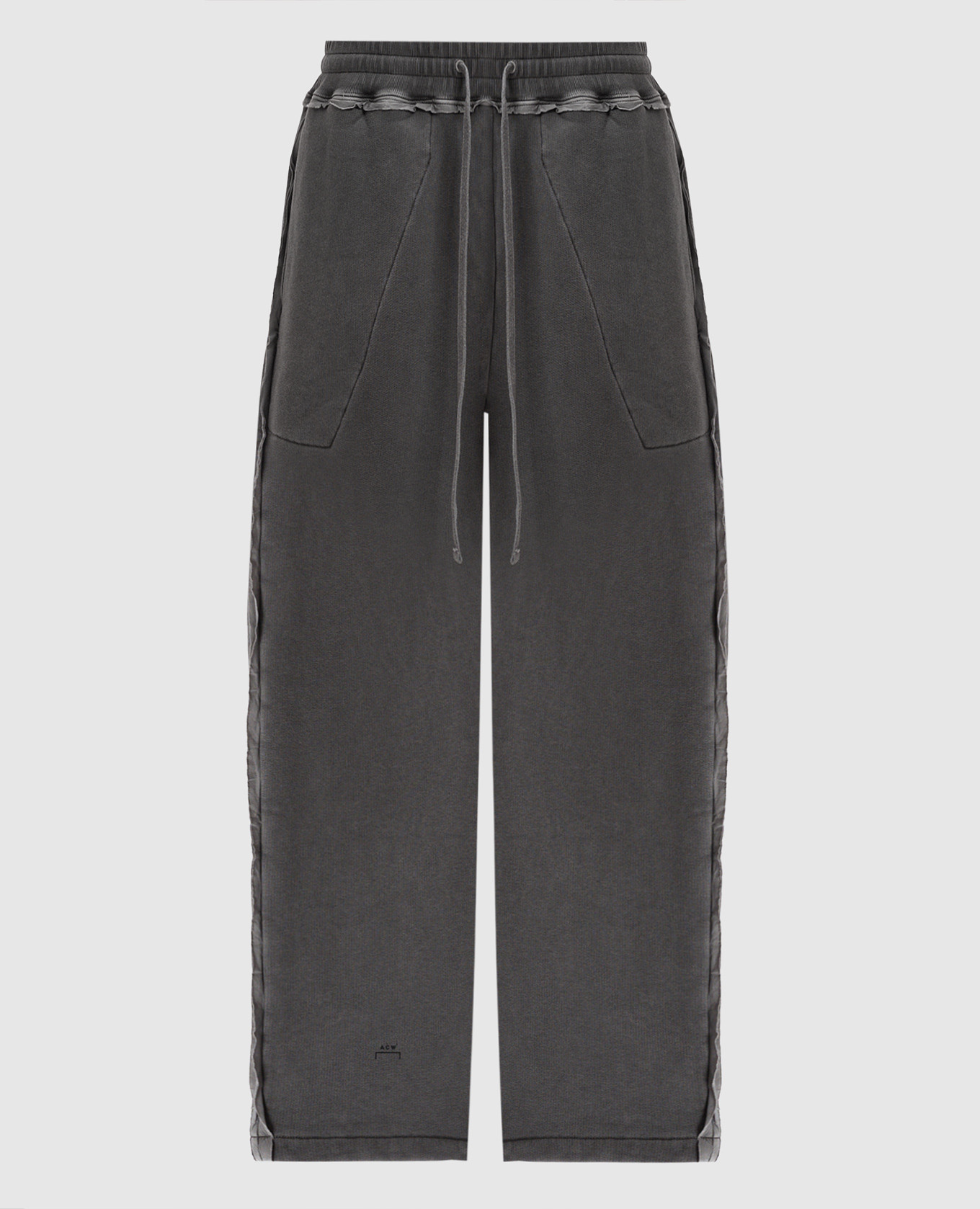Facade gray sweatpants a cold wall