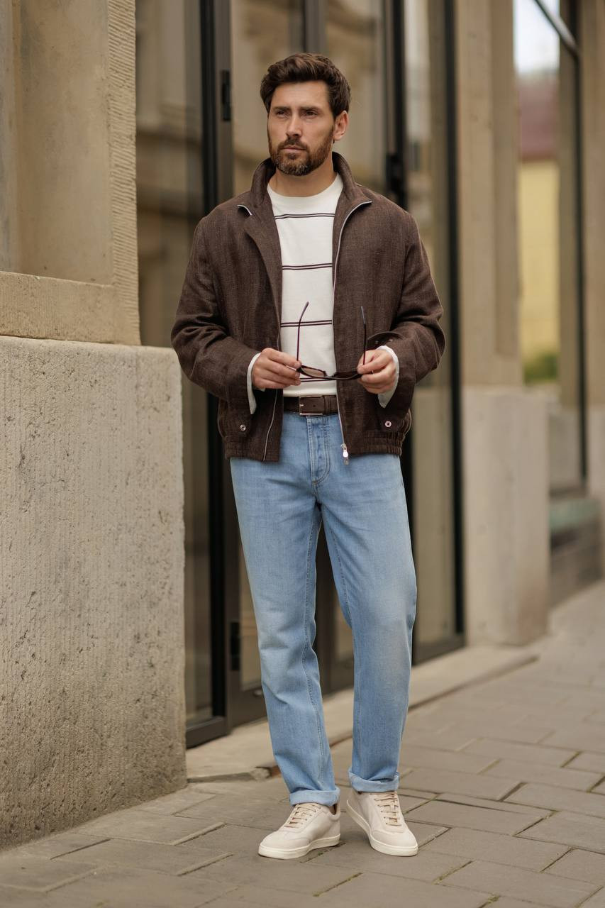 Blue jeans with leather logo patch Brunello Cucinelli 6