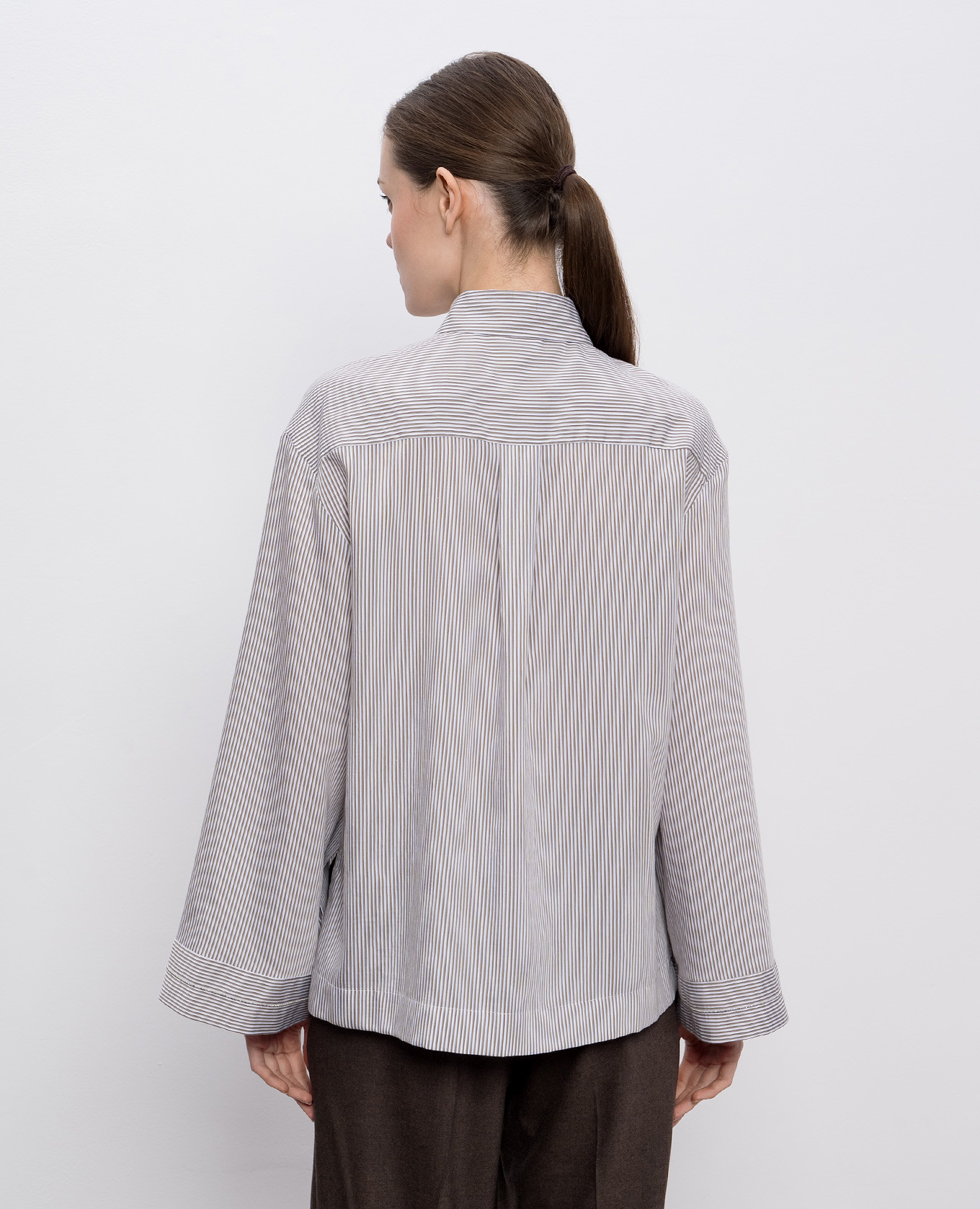 

Green striped blouse with monil chain Peserico