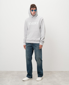 AMIRI Blue distressed jeans with logo AMDNGH1038