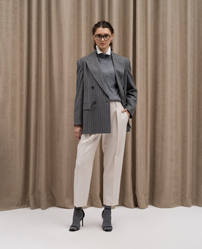 Brunello Cucinelli Beige woolen trousers with ecolathuni monil chain MP580P8562