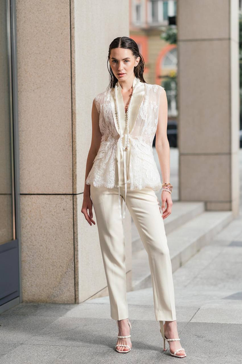 

Beige pants made of wool with stripes WARDROBE.NYC