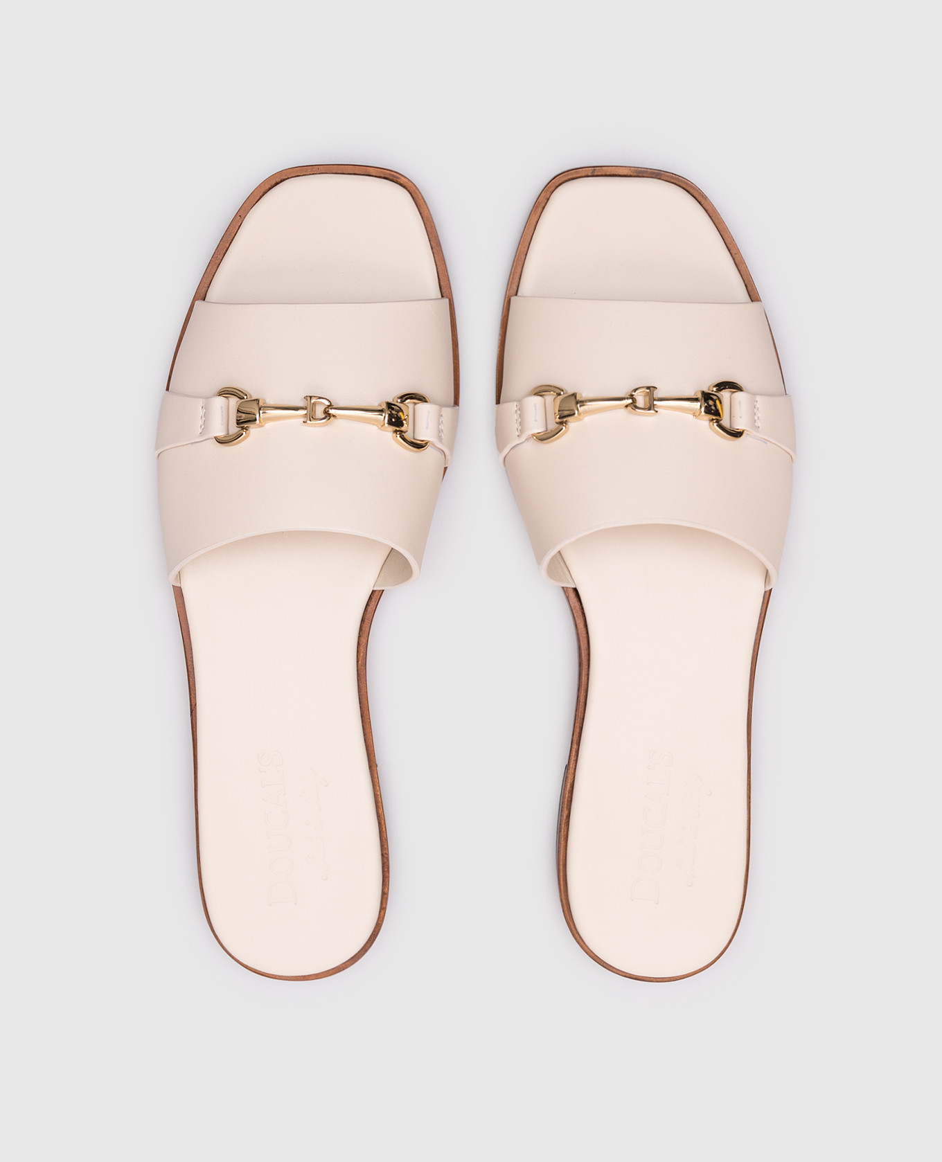 

Beige leather flip-flops with branded detail Doucal's