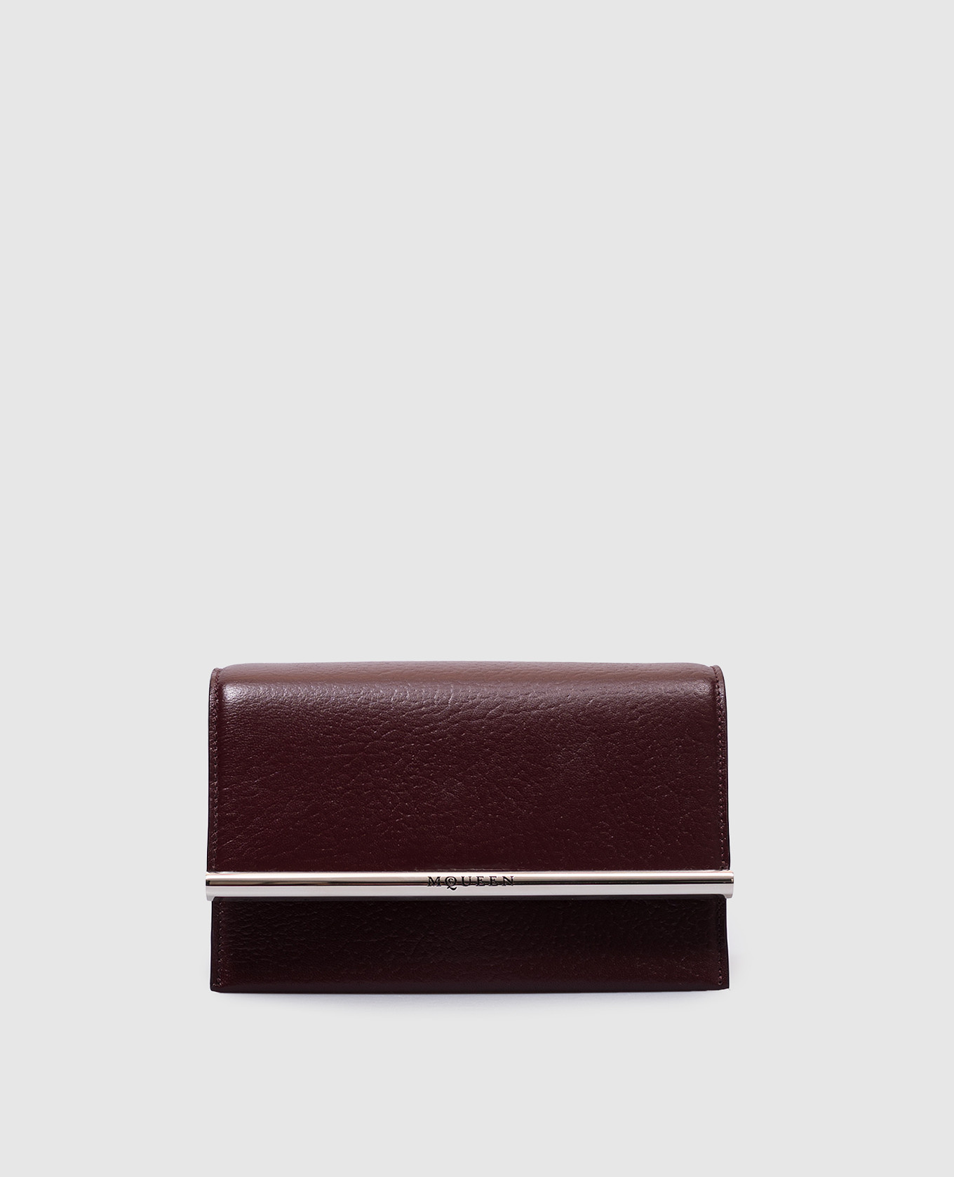 

Burgundy leather messenger bag with logo engraving Alexander McQueen