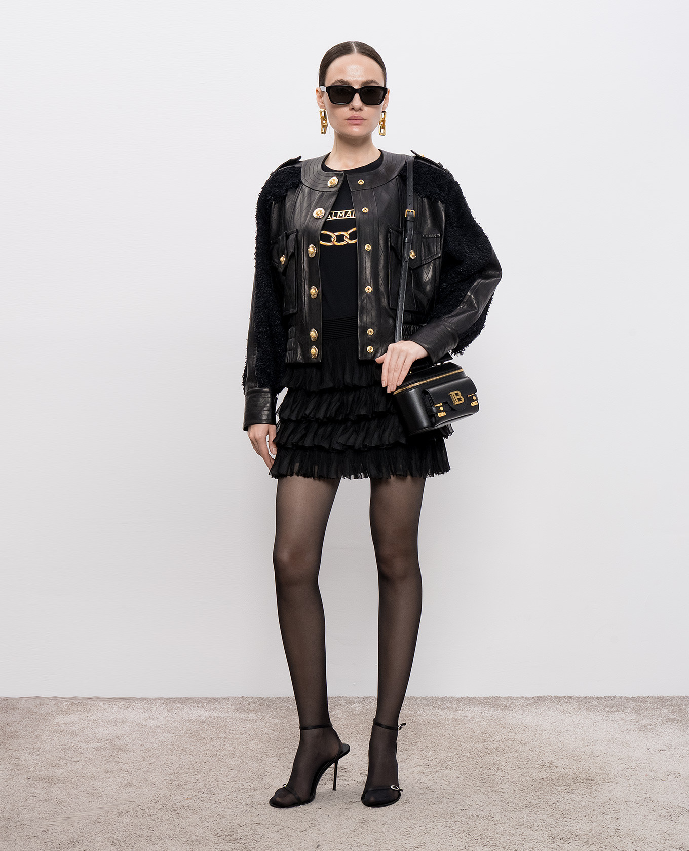 

Black leather jacket with tweed inserts Balmain