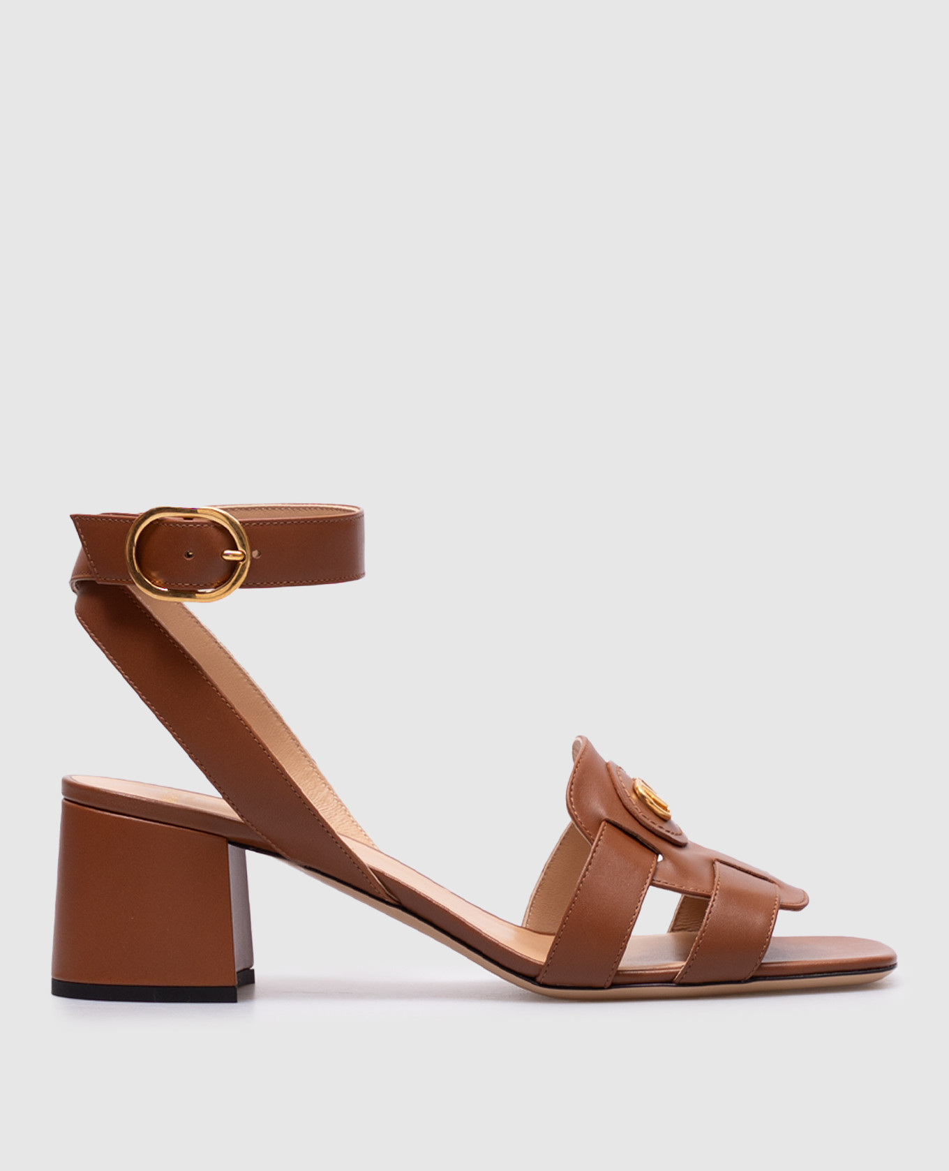 Brown leather sandals with metal VLogo Signature emblem Valentino