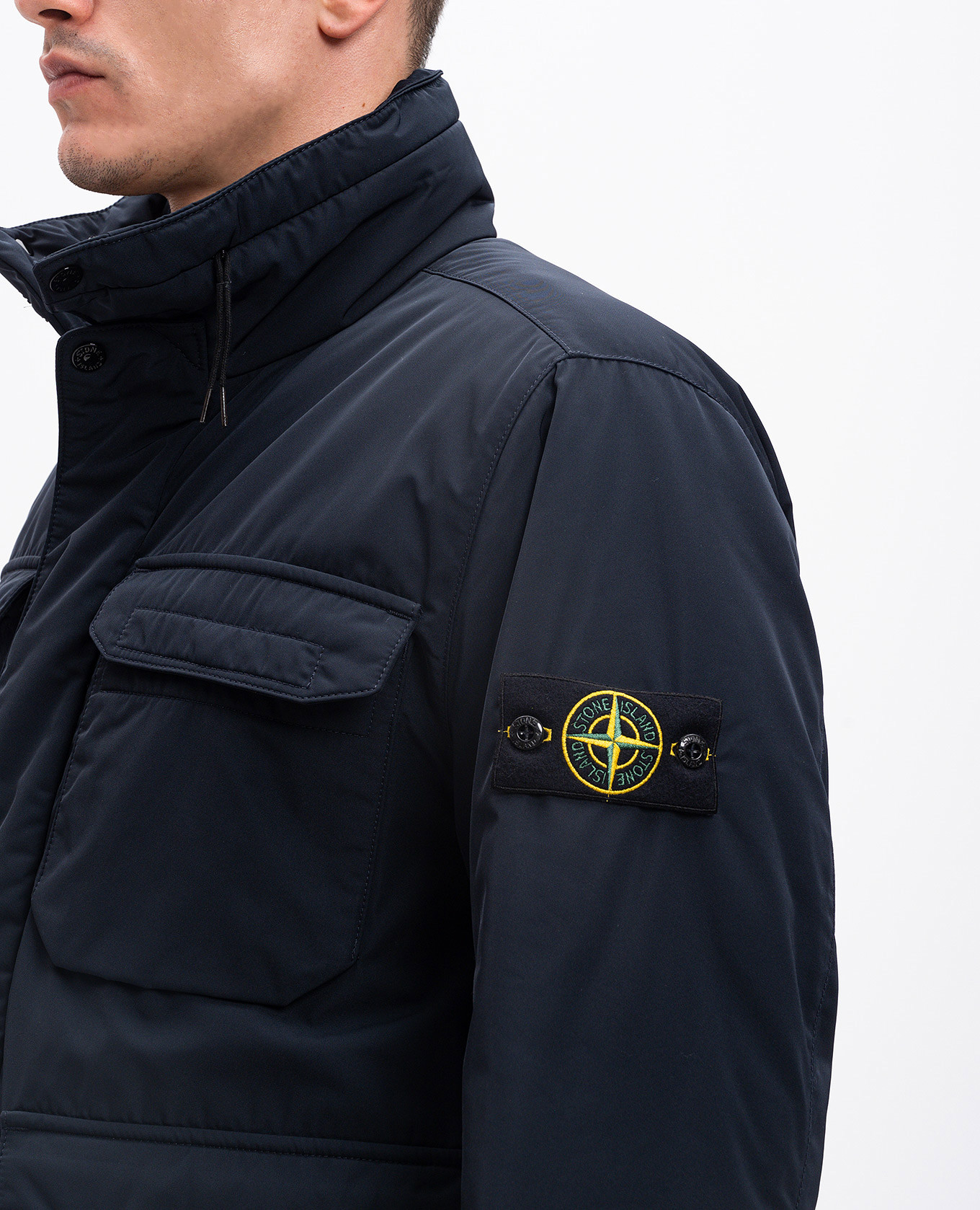 

Blue jacket with logo patch Stone Island