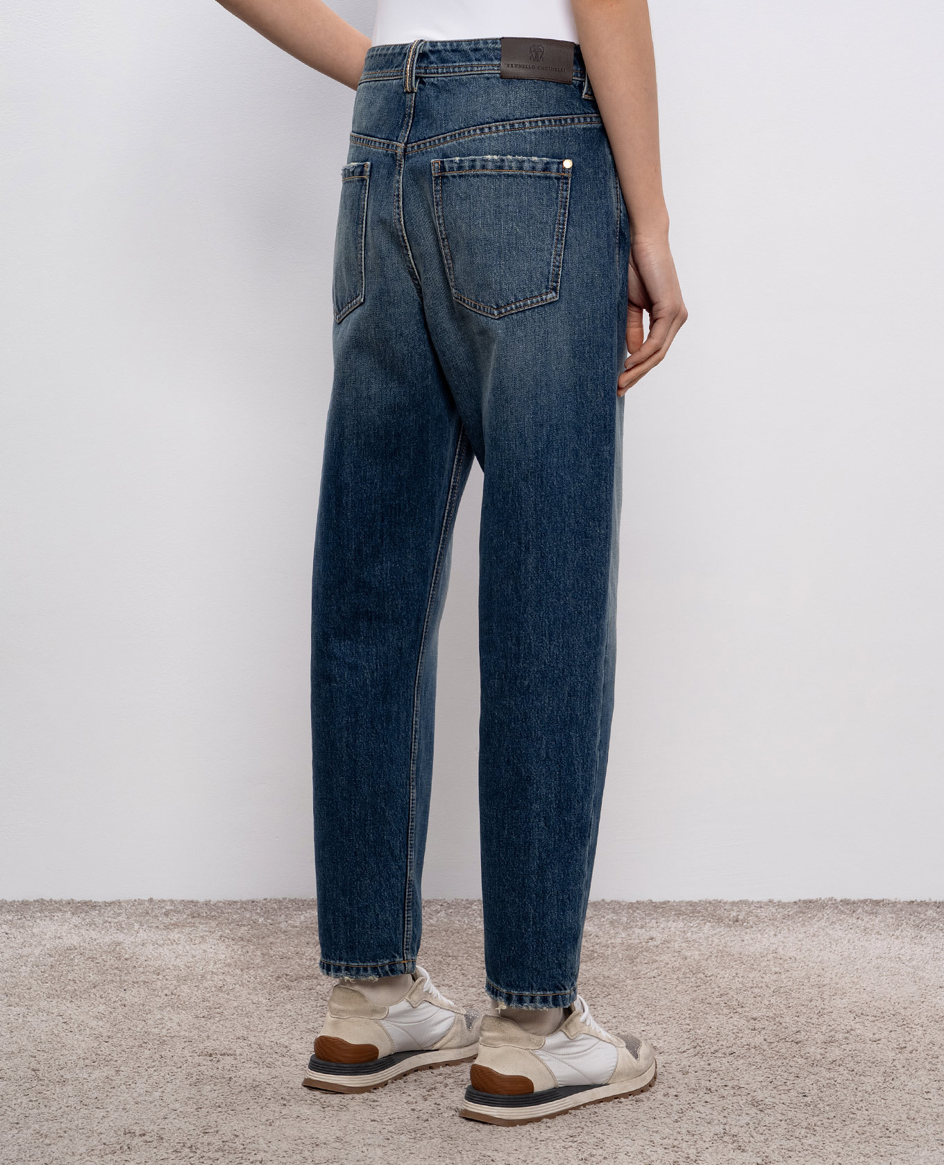 

Blue jeans with a monil chain Brunello Cucinelli