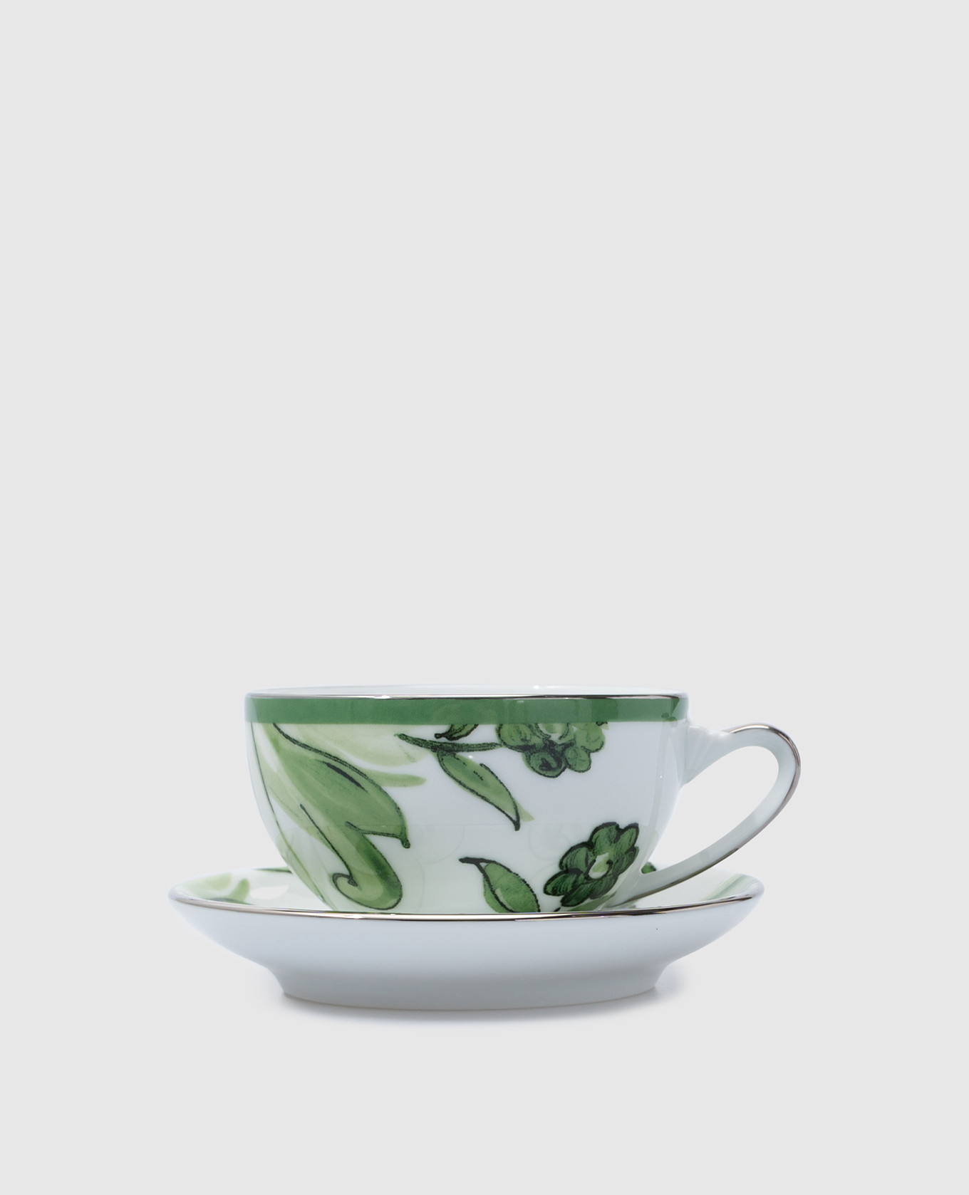 Teacup and saucer made of porcelain with a Majolica pattern