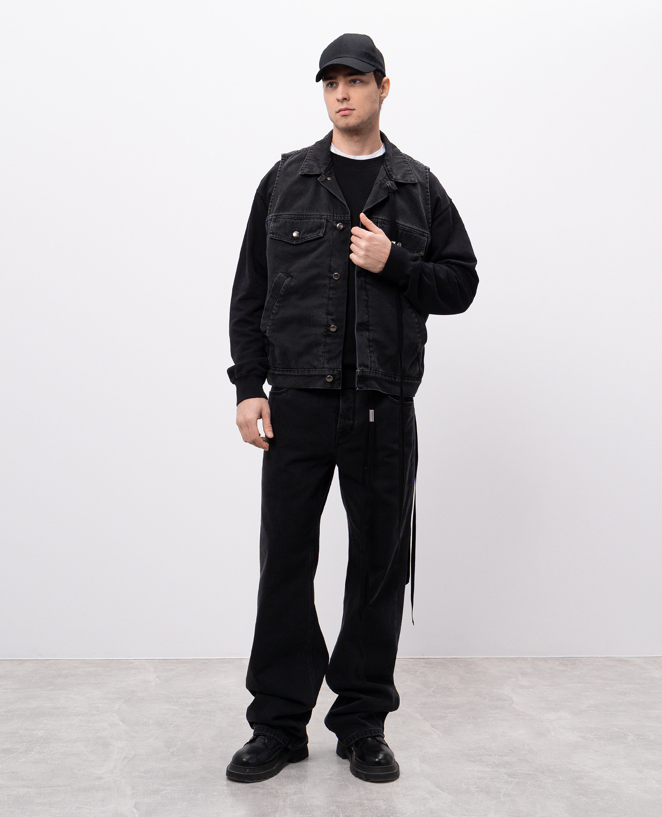 

Black denim vest with branded ribbons Ann Demeulemeester