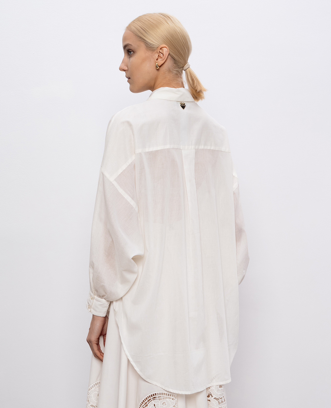 

Beige blouse with floral patch Twinset