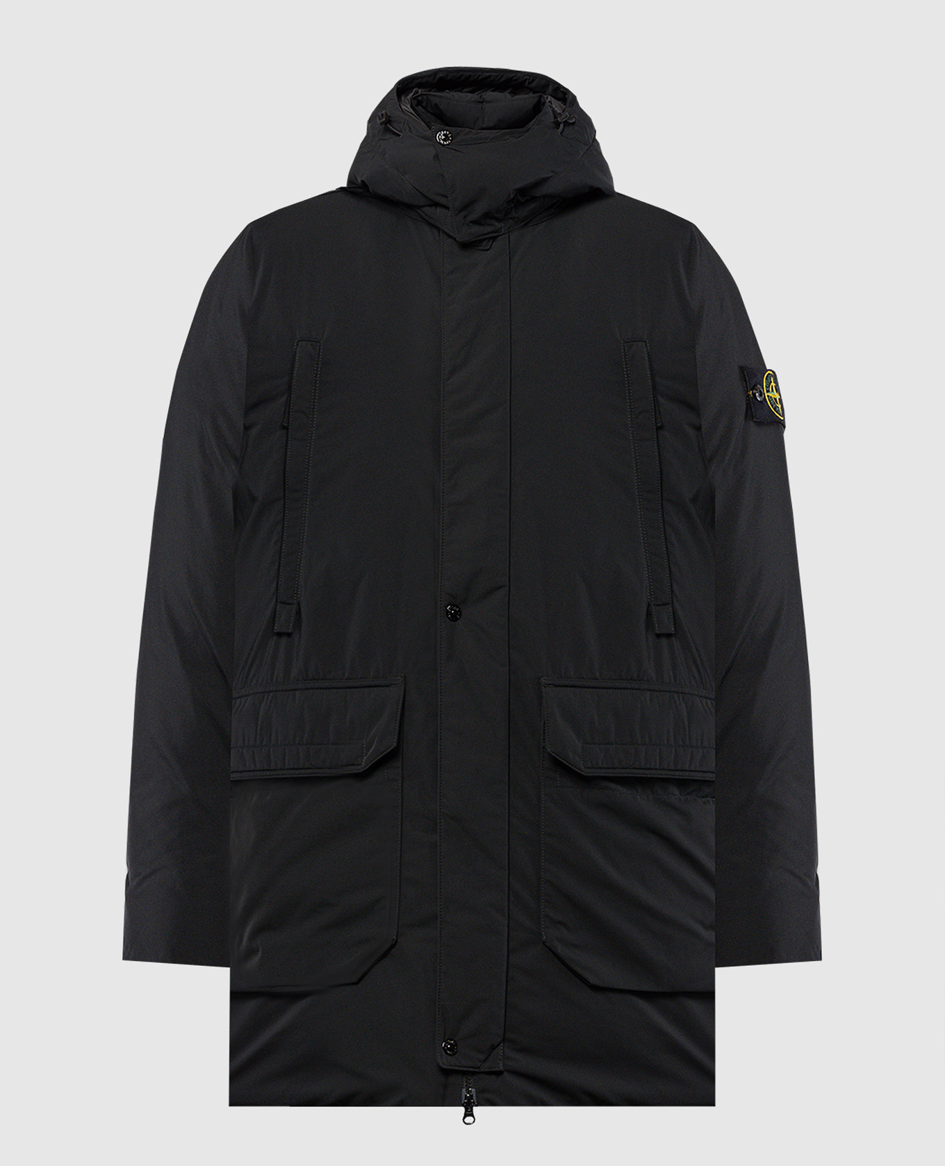 Black down jacket with logo patch stone island