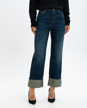 Alexander McQueen Blue jeans with logo flaps 797823QMACS
