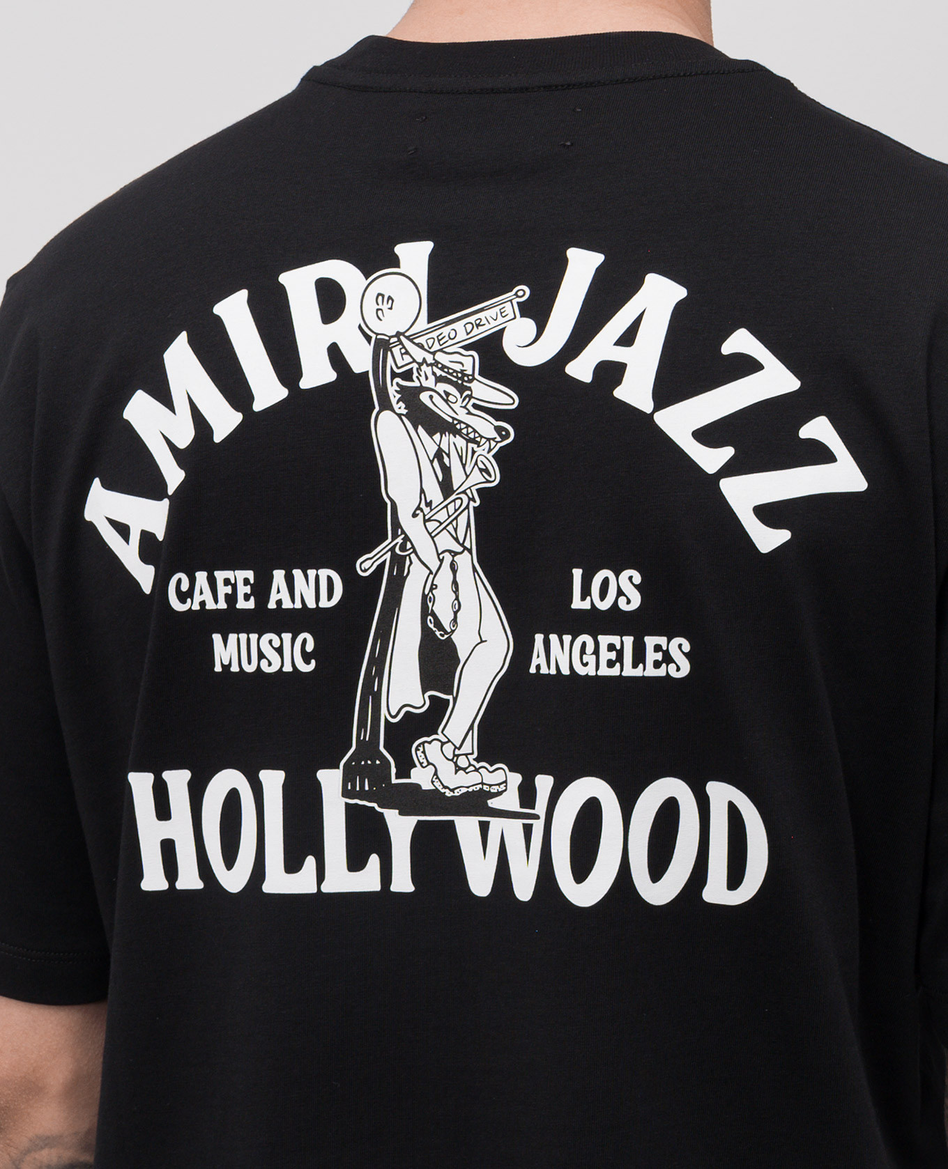 

JAZZ WOLF black T-shirt with logo print AMIRI