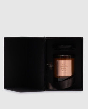 The Essential Blend Scented candle No. 70 in a glass candlestick TEB25070CAND