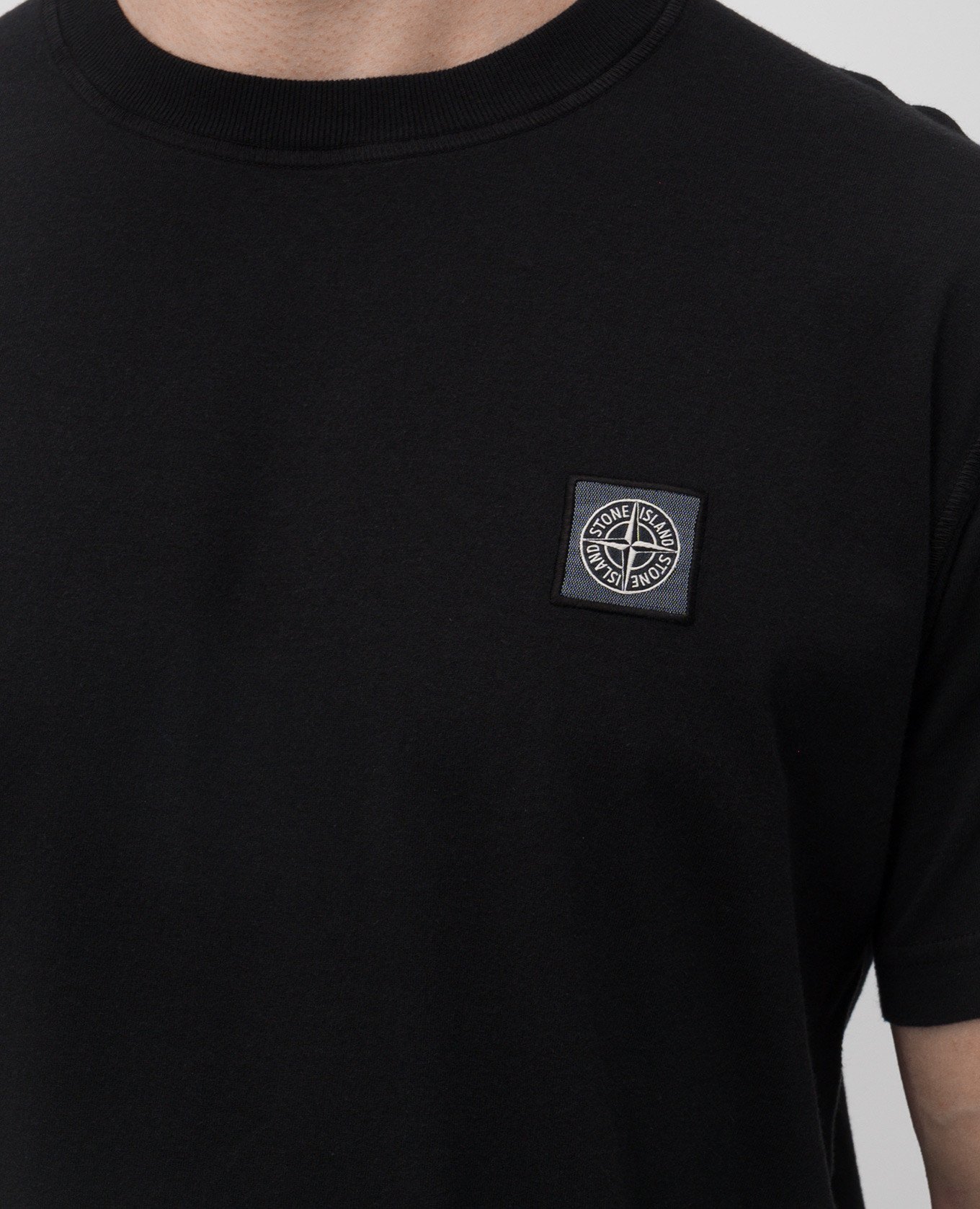 

Black T-shirt with logo patch Stone Island