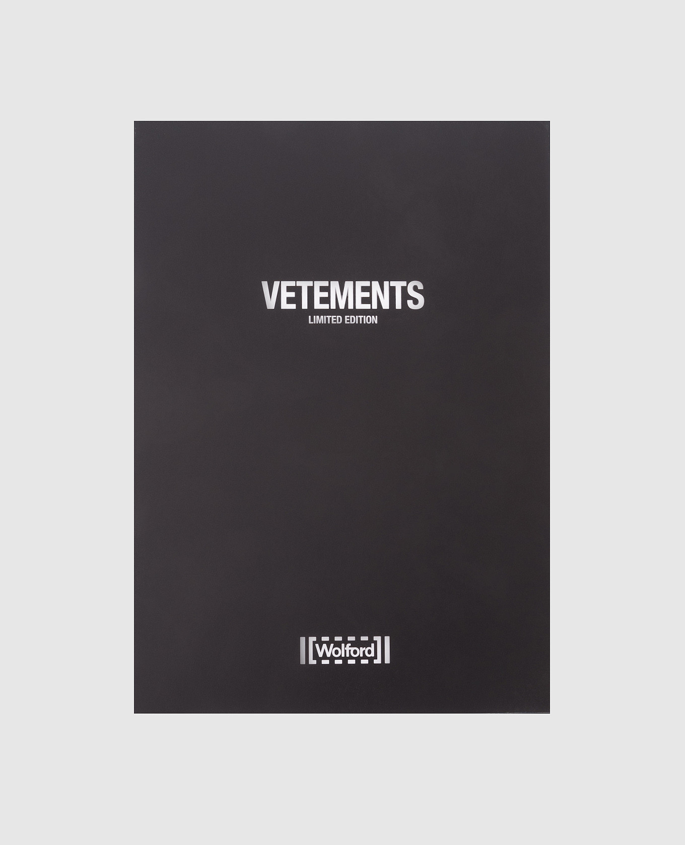 

Beige tights in a print collaboration with Wolford Vetements