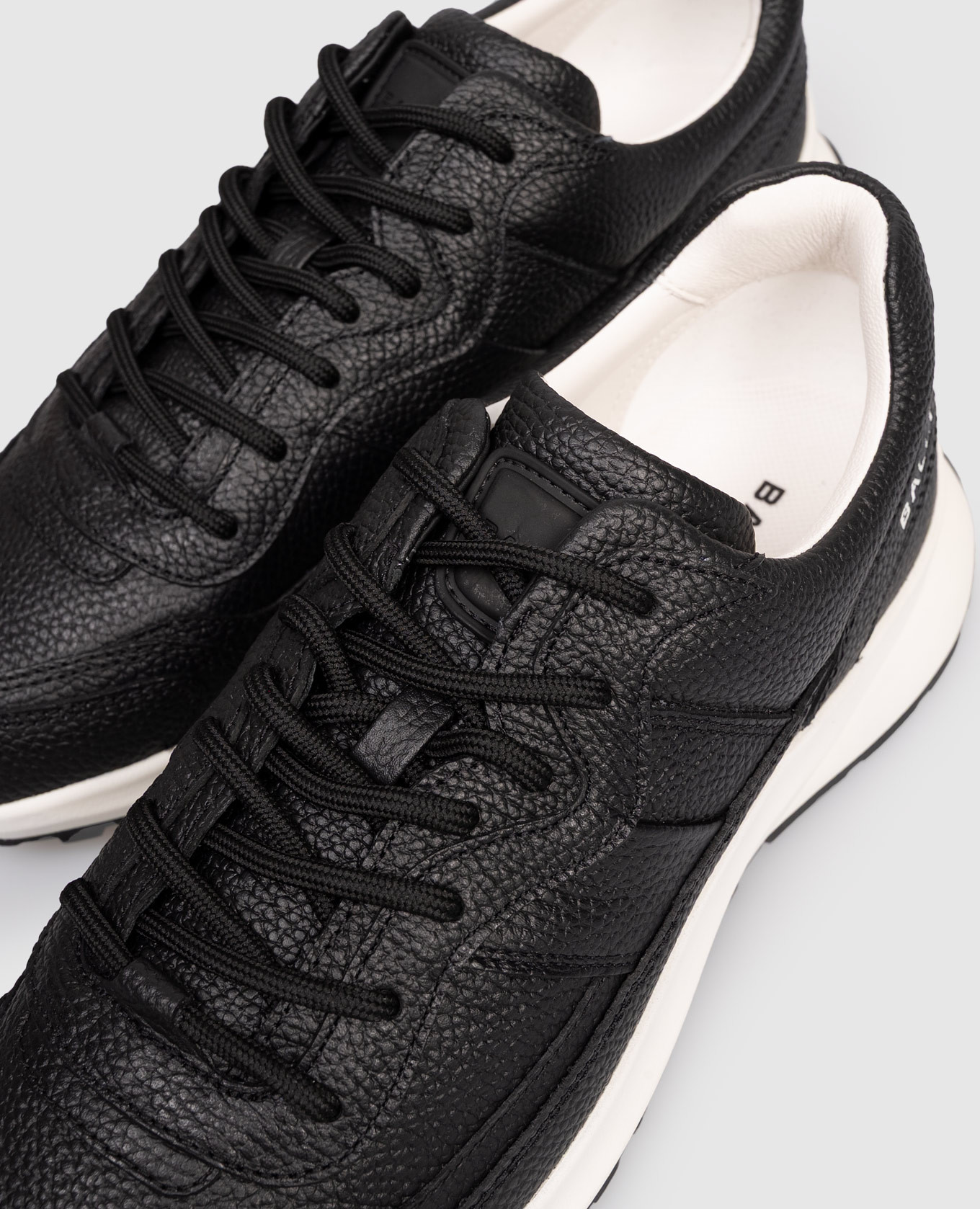 

Outline black leather sneakers with logo Bally