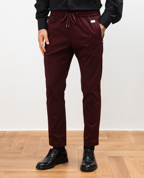 Dolce&Gabbana Burgundy pants with a logo GYACETFUFNV