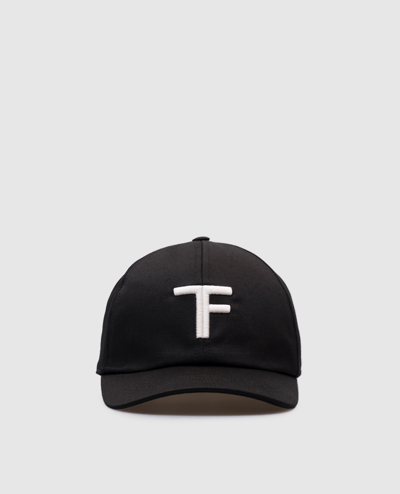 

Black cap with embroidered monogram logo Tom Ford