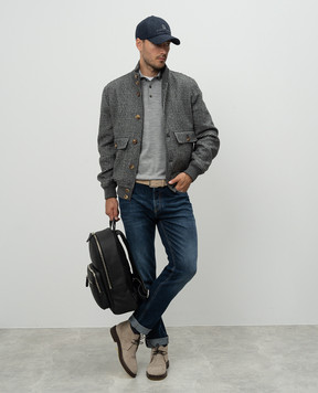 Brunello Cucinelli Blue jeans with a distressed effect and a logo patch M283PD3210