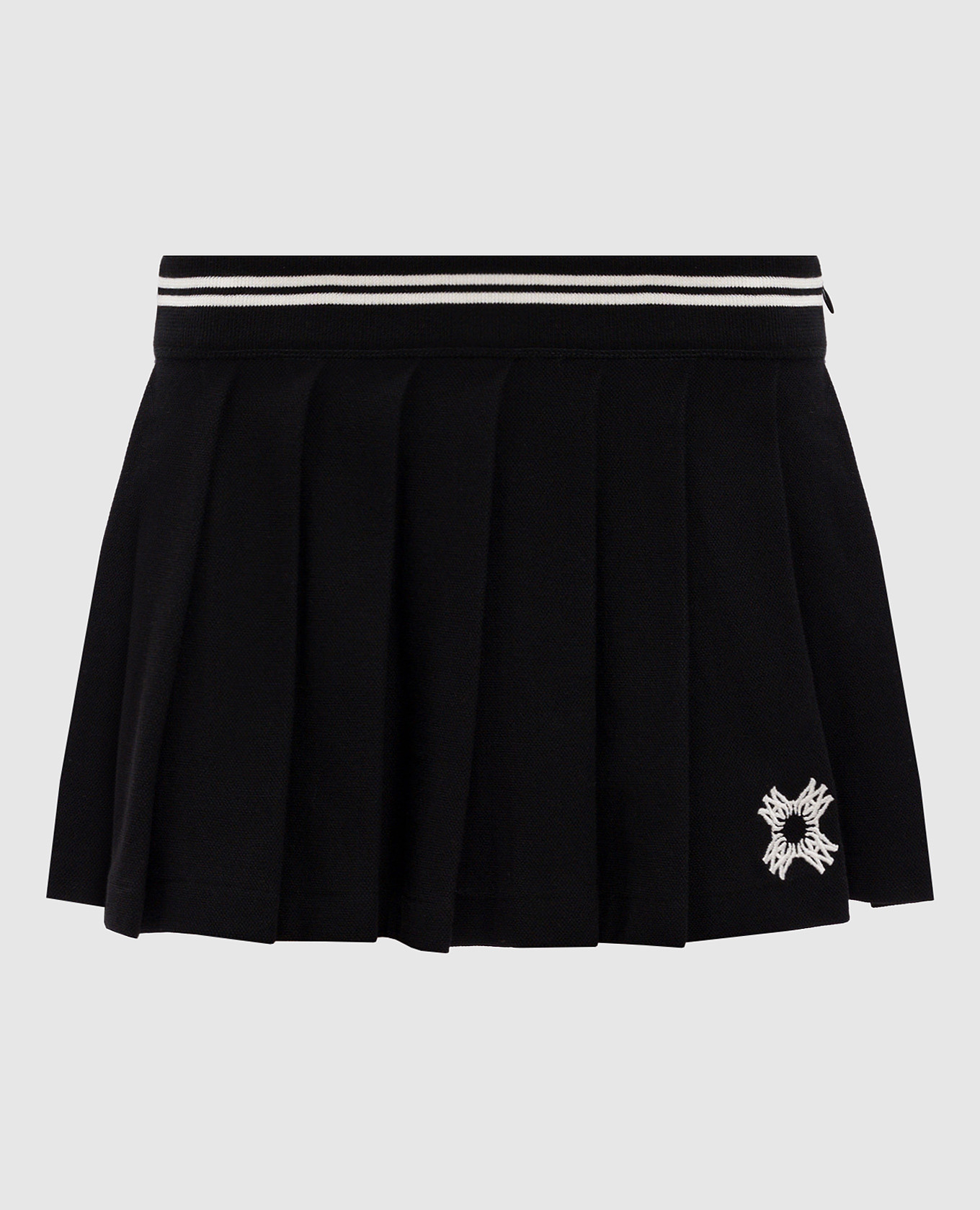 

Black pleated mini skirt with embroidered emblem AMIRI