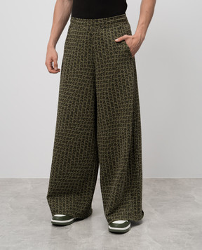 Vetements Green sweatpants in logo pattern UA65SP150K