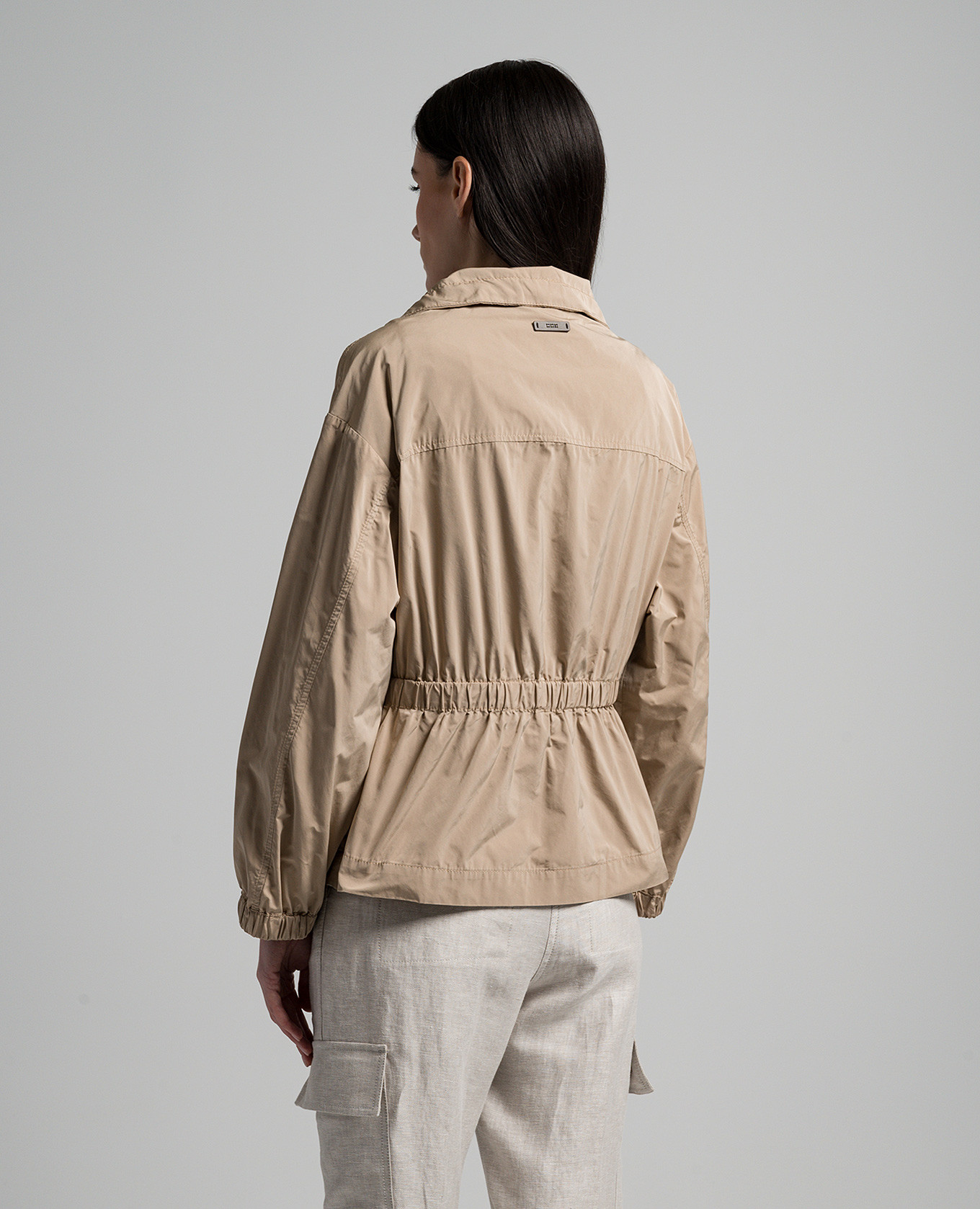 

Brown windbreaker with monil chain Peserico