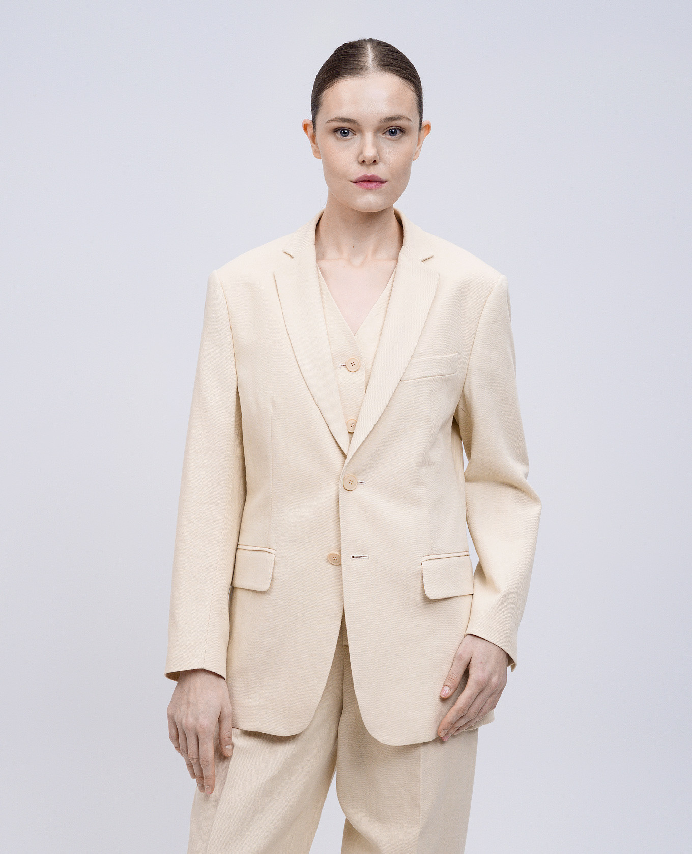 

Beige linen jacket with logo emblem Twinset